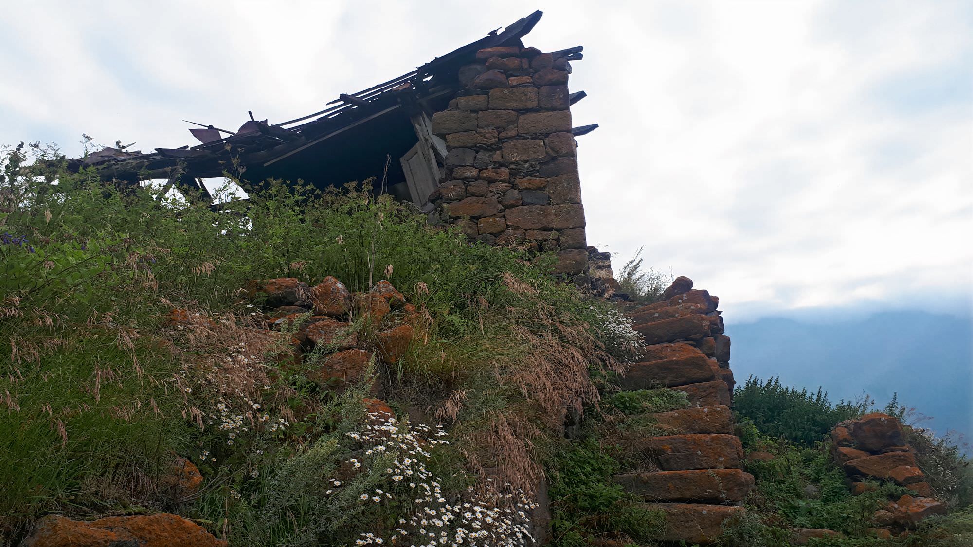 Ruined house in Toti village